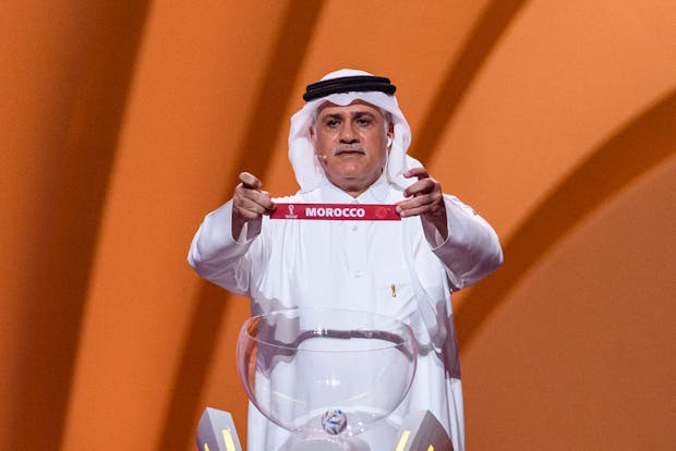 Former Qatar player Adel Ahmed MalAllah shows Morocco during FIFA World Cup Qatar 2022 Final Draw (Photo by Marcio Machado/Eurasia Sport Images/Getty Images)