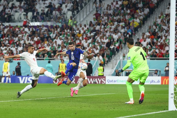 Christian Pulisic of the United States scores against Iran (Photo by Chris Brunsklil/ISI Photos/Getty Images)