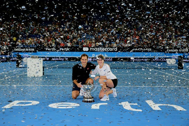 Roger Federer and Belinda Bencic of Switzerland celebrate after winning 2019 Hopman Cup at RAC Arena in Perth (Photo by Will Russell/Getty Images)