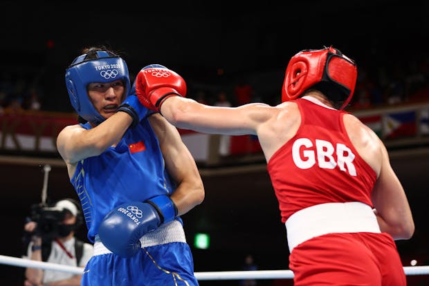 Lauren Price of Great Britain and Qian Li of China in action during the Women's Middle Final bout on day 16 of the Tokyo 2020 Olympics. (Buda Mendes/Getty Images)