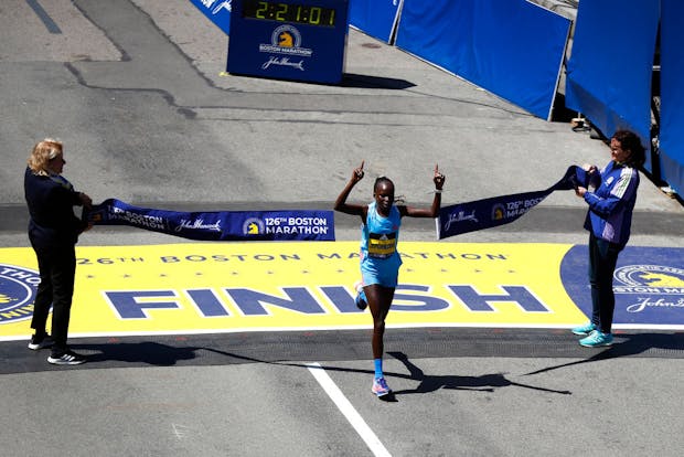 Peres Jepchirchir of Kenya crosses the finish line to win the professional women's division of the 126th Boston Marathon on April 18, 2022 (Omar Rawlings/Getty Images)