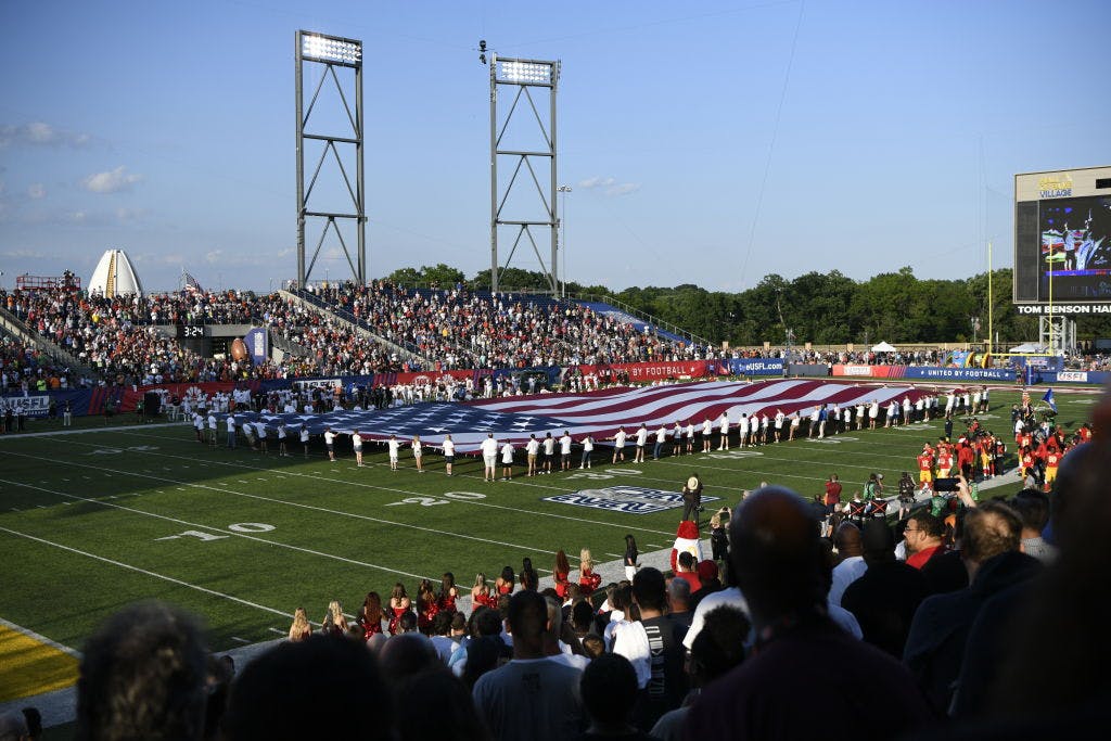 How might a USFL-XFL football merger affect Memphis Showboats?