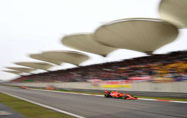 Charles Leclerc driving for Ferrari during the 2019 Chinese Grand Prix (by Clive Mason/Getty Images)