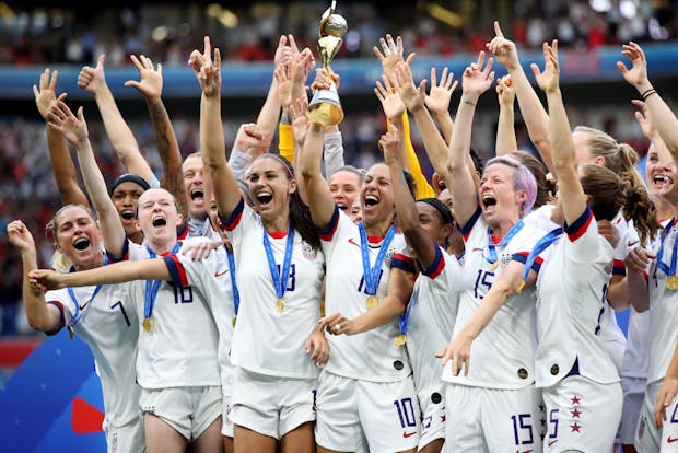 USA players celebrate with the trophy after the 2019 FIFA Women's World Cup final against the Netherlands (Photo by Marc Atkins/Getty Images)