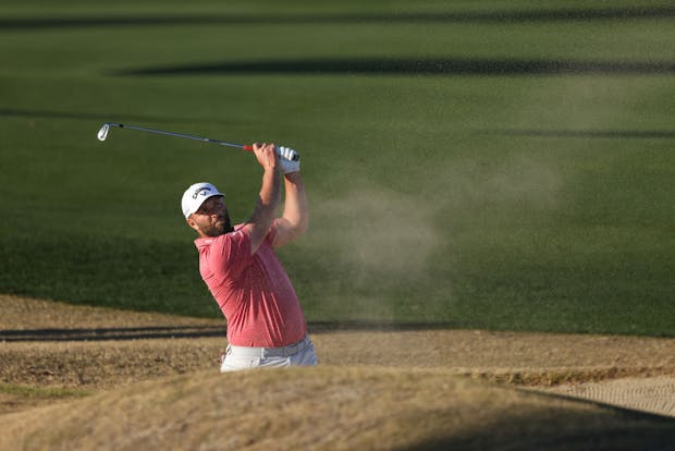 Jon Rahm of Spain plays a shot from a bunker on the 18th hole during the final round of The American Express (Photo by Katelyn Mulcahy/Getty Images)