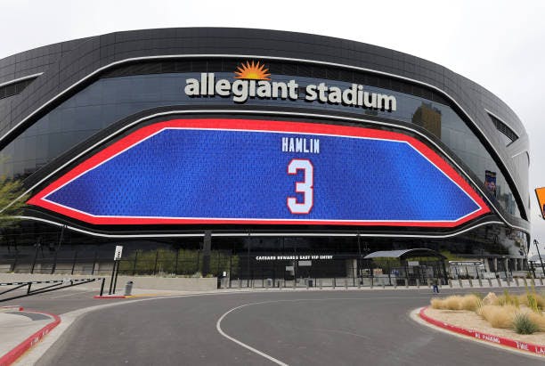 Allegiant Stadium, home of the National Football League's Las Vegas Raiders, one of many facilities lit in support of injured Buffalo Bills safety Damar Hamlin. (Ethan Miller/Getty Images)