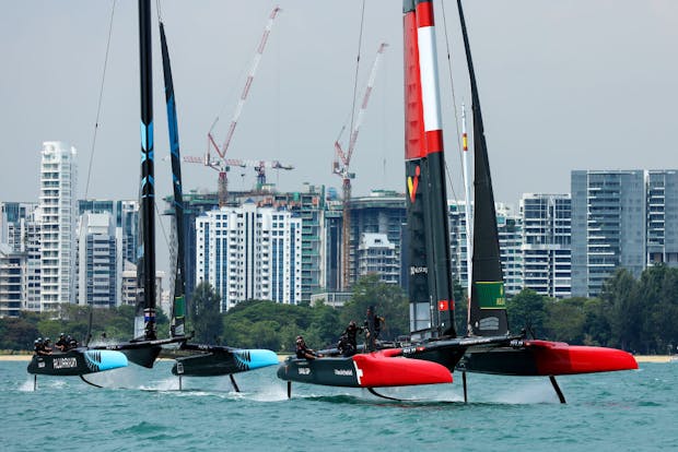 Team Switzerland and Team New Zealand compete in the Singapore Sail Grand Prix on January 15, 2023 (by Yong Teck Lim/Getty Images)