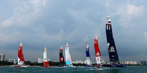 Teams compete in fleet race three during race day 2 of the Singapore Sail Grand Prix (Photo by Yong Teck Lim/Getty Images)