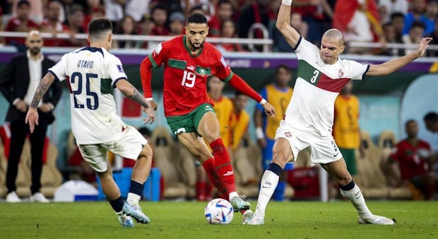 Otavio of Portugal, Youssef En Nesyri of Morocco and Pepe of Portugal during the World Cup quarter-final between Morocco and Portugal (ANP via Getty Images)
