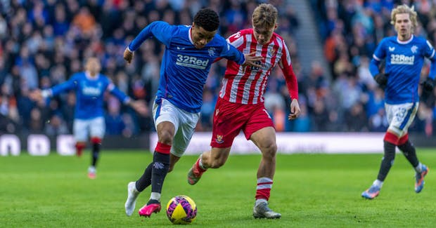 Malik Tillman of Rangers and Cameron MacPherson of St Johnstone battle for the ball (Photo by Richard Callis/MB Media)