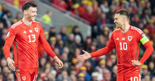 Kieffer Moore and Aaron Ramsey of Wales during the Euro 2024 qualifying match against Latvia (Photo by Athena Pictures/Getty Images)