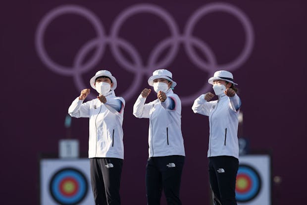 Team South Korea pose on the medal stand after winning the women’s archery team competition at the Tokyo 2020 Olympic Games (Justin Setterfield/Getty Images)