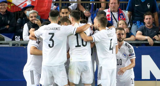 Edin Dzeko of Bosnia and Herzegovina celebrates his goal with teammates (Photo by John Berry/Getty Images)