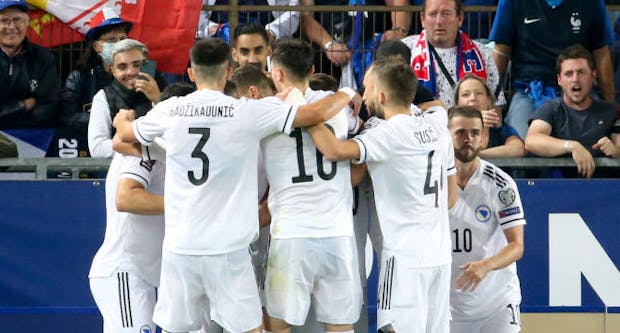 Edin Dzeko of Bosnia and Herzegovina celebrates his goal with teammates (Photo by John Berry/Getty Images)