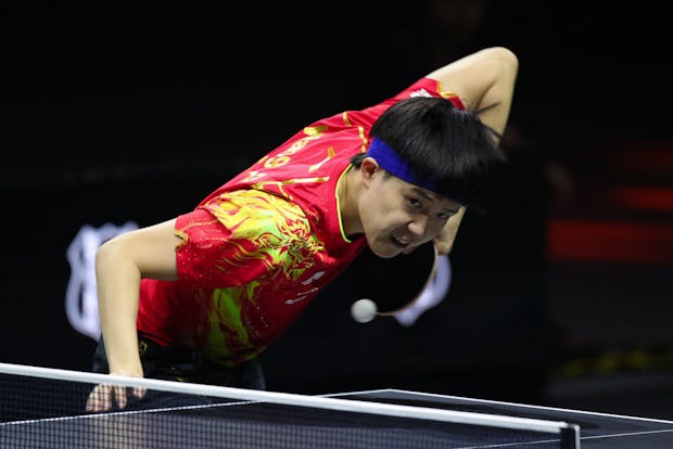 Wang Chuqin of China serves against Lim Jonghoon of Republic of Korea (Photo by Thananuwat Srirasant/Getty Images)