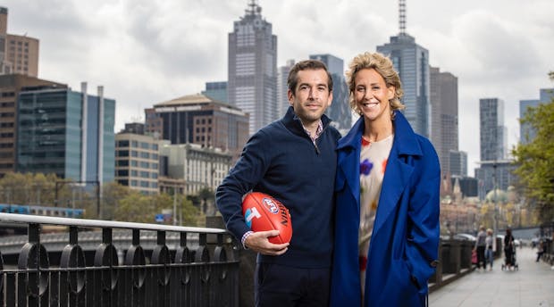 Zohar Ravid of Fanatics with the AFL's Kylie Rogers (Credit: AFL)