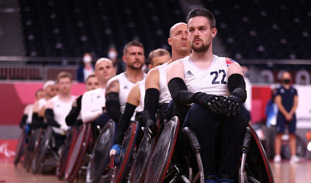 Team Great Britain look on during the national anthems before the Tokyo 2020 gold medal match against Team United States (Photo by Alex Pantling/Getty Images)
