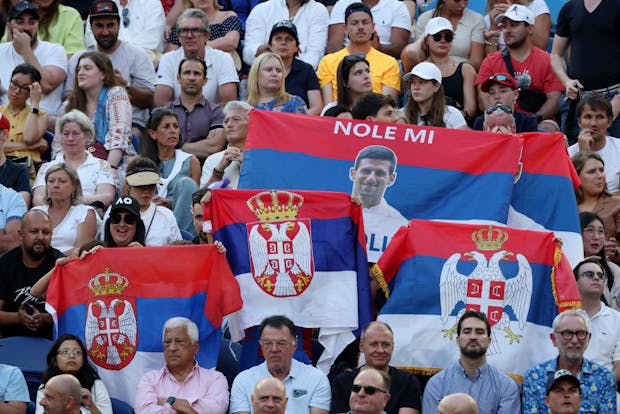 Novak Djokovic fans show their support during his fourth round singles match against Alex de Minaur at the 2023 Australian Open (by Mark Kolbe/Getty Images)
