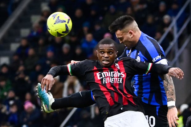 Lautaro Martinez of FC Internazionale and Pierre Kalulu of AC Milan compete in the Milan Derby. (Photo by Stefano Guidi/Getty Images)