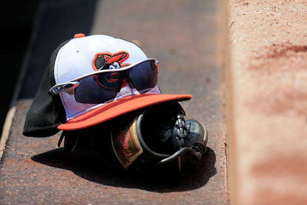 A Baltimore Orioles hat and glove (Getty Images)
