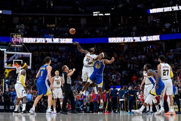 Tip off between the Denver Nuggets and Golden State Warriors during a 2022-23 regular season NBA game. (Getty Images)