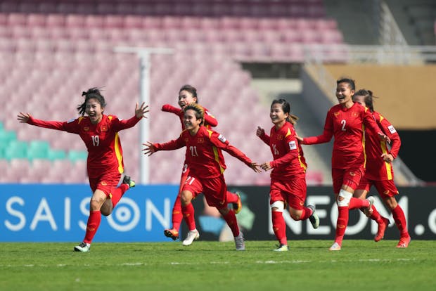 Vietnam players celebrate qualification for the 2023 Fifa Women's World Cup (Photo by Thananuwat Srirasant/Getty Images)