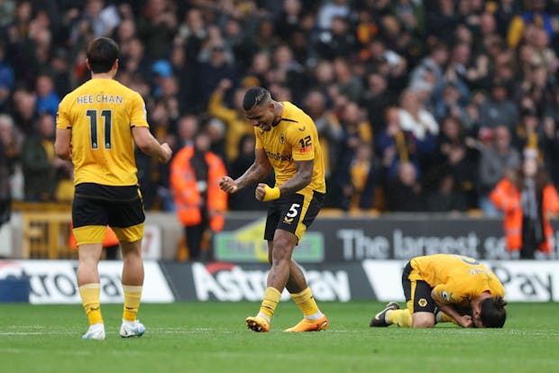 Hwang Hee-chan, Mario Lemina and Ruben Neves of Wolverhampton Wanderers celebrate victory after the Premier League match against Aston Villa on May 6, 2023  (by Matthew Ashton - AMA/Getty Images)