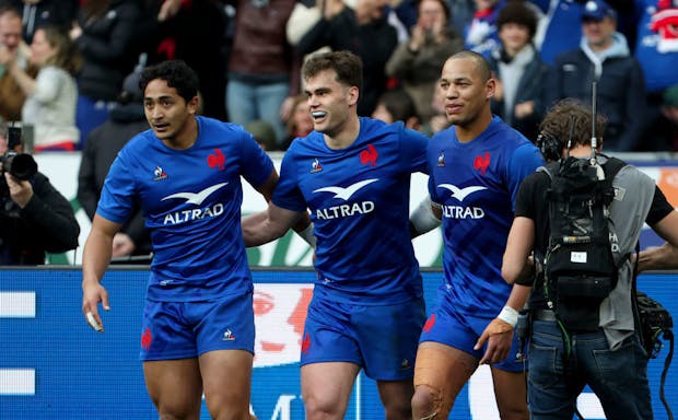 Damian Penaud of France (centre) celebrates his try during the Six Nations match versus Wales on March 18, 2023 (Jean Catuffe/Getty Images)