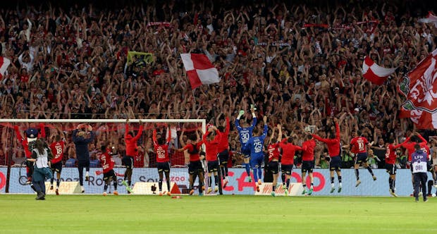 Lille players celebrate the victory with their supporters following the Ligue 1 match against Olympique de Marseille (Photo by Jean Catuffe/Getty Images).