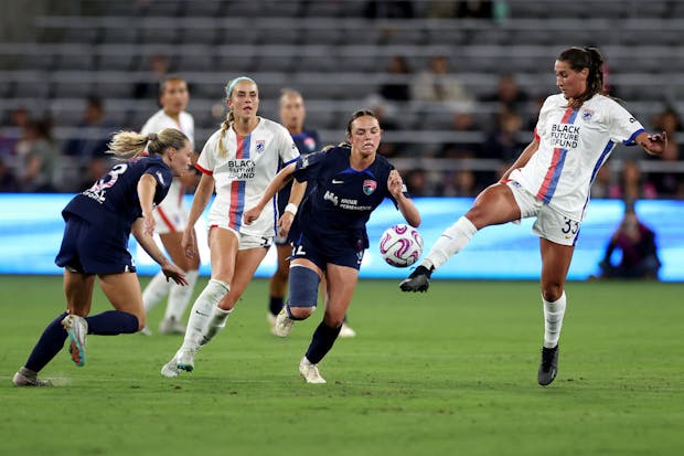 Jordyn Huitema and Olivia Van Der Jagt of the OL Reign control the ball (Photo by Sean M. Haffey/Getty Images)