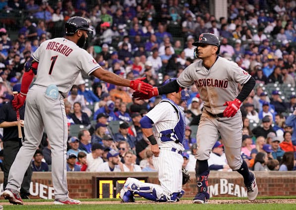 Andres Gimenez of the Cleveland Guardians,is congratulated by Amed Rosario. (Nuccio DiNuzzo/Getty Images)