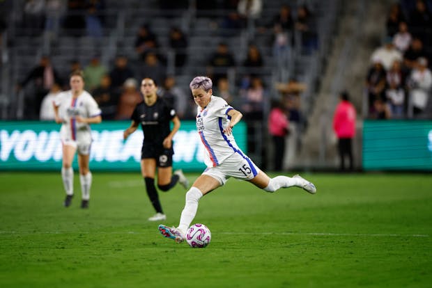 Megan Rapinoe #15 of OL Reign controls the ball against Angel City FC (Photo by Ronald Martinez/Getty Images)
