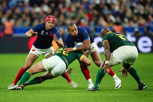 Gael Fickou of France is tackled by Handre Pollard of South Africa during the Rugby World Cup quarter final match on October 15, 2023