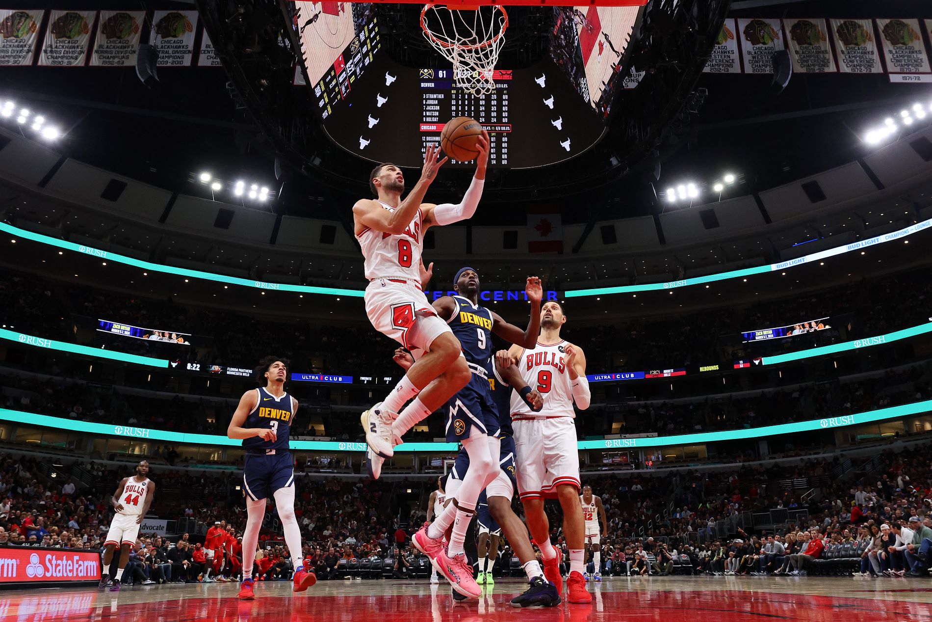 CHICAGO, ILLINOIS - OCTOBER 12: Zach LaVine #8 of the Chicago Bulls goes up for a layup against the Denver Nuggets during the second half at the United Center on October 12, 2023 in Chicago, Illinois. NOTE TO USER: User expressly acknowledges and agrees that, by downloading and or using this photograph, User is consenting to the terms and conditions of the Getty Images License Ag