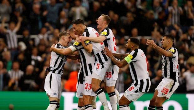 NEWCASTLE UPON TYNE, ENGLAND - OCTOBER 4: Anthony Gordon of Newcastle United and Dan Burn of Newcastle United celebrate with team after the 2nd goal during the UEFA Champions League match between Newcastle United and Paris Saint-Germain at St. James' Park on October 4, 2023 in Newcastle Upon Tyne, England. (Photo by