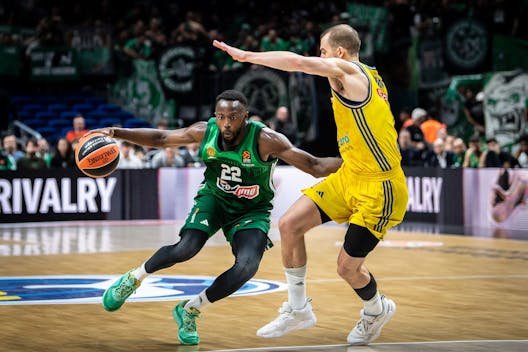 BERLIN, GERMANY - NOVEMBER 10: Jerian Grant #22 of Panathinaikos Athens drives against Matt Thomas #11 of Alba Berlin during the Turkish Airlines EuroLeague Regular Season Round 7 match between Alba Berlin and Panathinaikos Athens at Mercedes Benz Arena on November 10, 2023 in Berlin, Germany. (Photo by