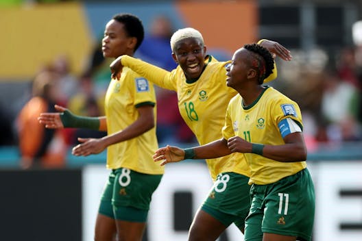DUNEDIN, NEW ZEALAND - JULY 28: Thembi Kgatlana (R) of South Africa celebrates with teammate Sibulele Holweni (C) after scoring her team's second goal during the FIFA Women's World Cup Australia & New Zealand 2023 Group G match between Argentina and South Africa at Dunedin Stadium on July 28, 2023 in Dunedin, New Zealand. (Photo by