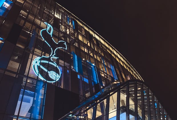 LONDON - NOVEMBER 26, 2019: Exterior of ground at Tottenham Hotspur stadium logo in the Premier League
