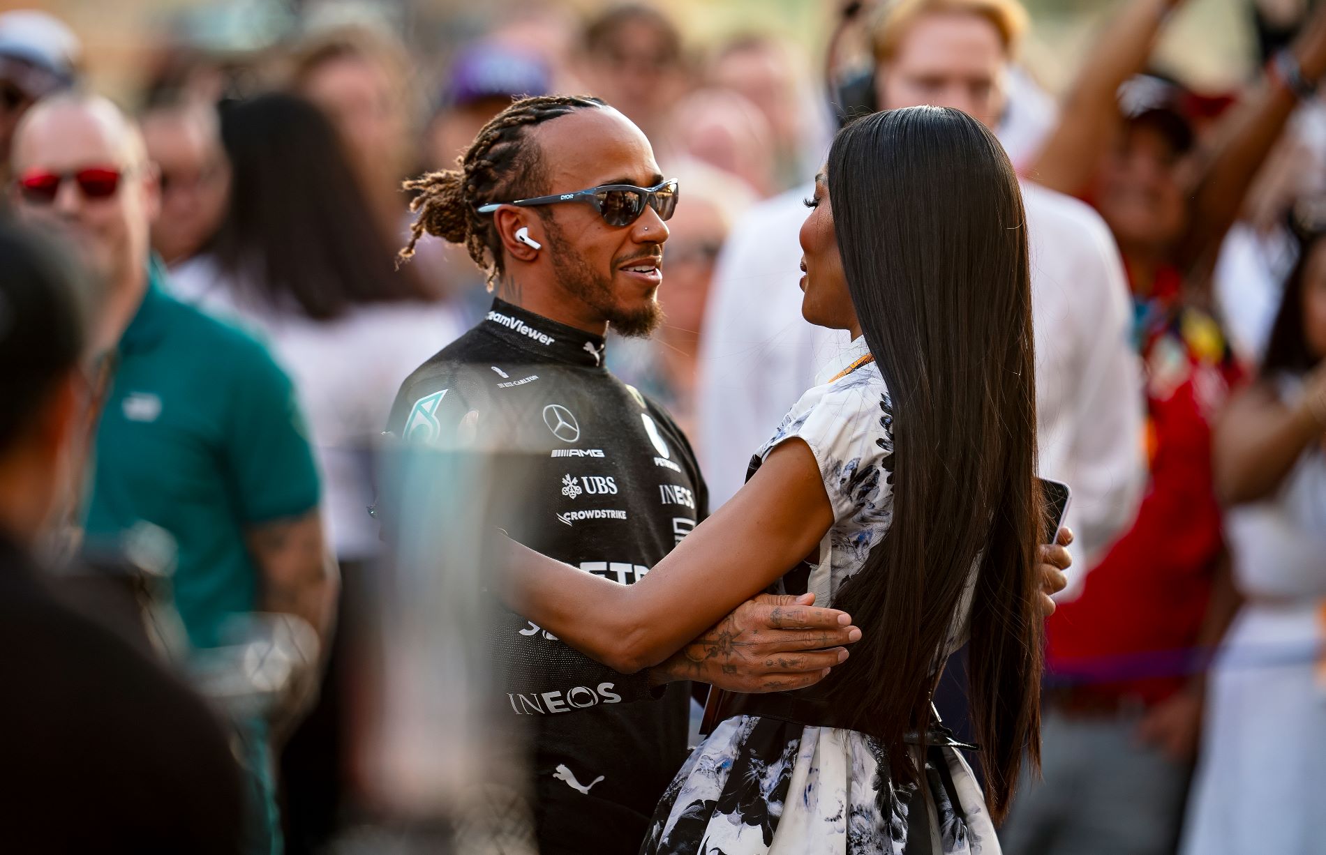 ABU DHABI, UNITED ARAB EMIRATES - NOVEMBER 26: Lewis Hamilton of Great Britain and Mercedes-AMG PETRONAS F1 Team and Naomi Campbell greet each other during the F1 Grand Prix of Abu Dhabi at Yas Marina Circuit on November 26, 2023 in Abu Dhabi, United Arab Emirates. (Photo by