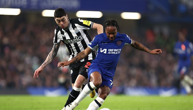 LONDON, ENGLAND - MARCH 11: Raheem Sterling of Chelsea is tackled by Miguel Almiron of Newcastle United during the Premier League match between Chelsea FC and Newcastle United at Stamford Bridge on March 11, 2024 in London, England. (Photo by Alex Pantling/Getty Images)