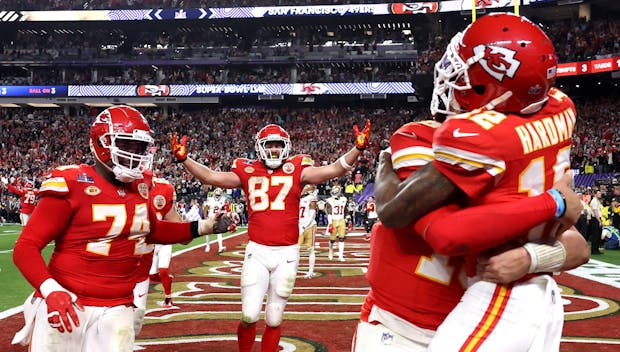 LAS VEGAS, NEVADA - FEBRUARY 11: Mecole Hardman Jr. #12 of the Kansas City Chiefs celebrates with Patrick Mahomes #15 and teammates after catching the game-winning touchdown pass to defeat the San Francisco 49ers 25-22 during Super Bowl LVIII at Allegiant Stadium on February 11, 2024 in Las Vegas, Nevada. (Photo by Ezra Shaw/Getty Images)