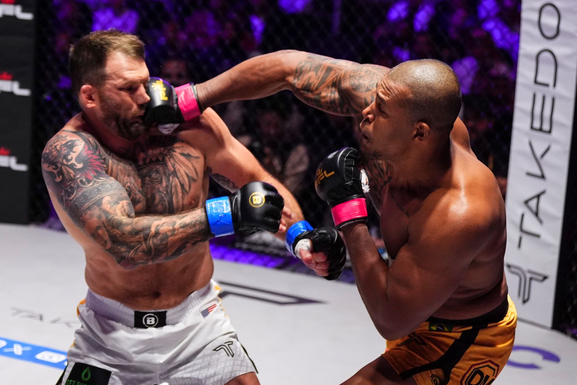 RIYADH, SAUDI ARABIA - FEBRUARY 25: Renan Ferreira throws a punch against Ryan Bader during the 2024 PFL vs Bellator: Champs event at Kingdom Arena on February 25, 2024 in Riyadh. (Photo by Cooper Neill/Getty Images)