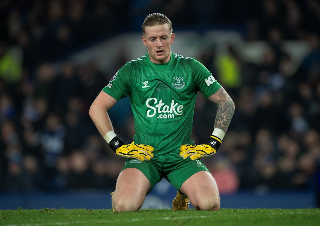 LIVERPOOL, ENGLAND - NOVEMBER 26: A dejected Everton goalkeeper Jordan Pickford after conceding the third goal during the Premier League match between Everton FC and Manchester United at Goodison Park on November 26, 2023 in Liverpool, England. (Photo by Visionhaus/Getty Images)