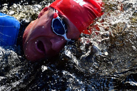 KUOPIO, FINLAND - AUGUST 14: Athletes in action on the swim leg during the IRONMAN Finland Kuopio-Tahko on August 14, 2021 in Kuopio, Finland. (Photo by Alexander Koerner/Getty Images for IRONMAN)
