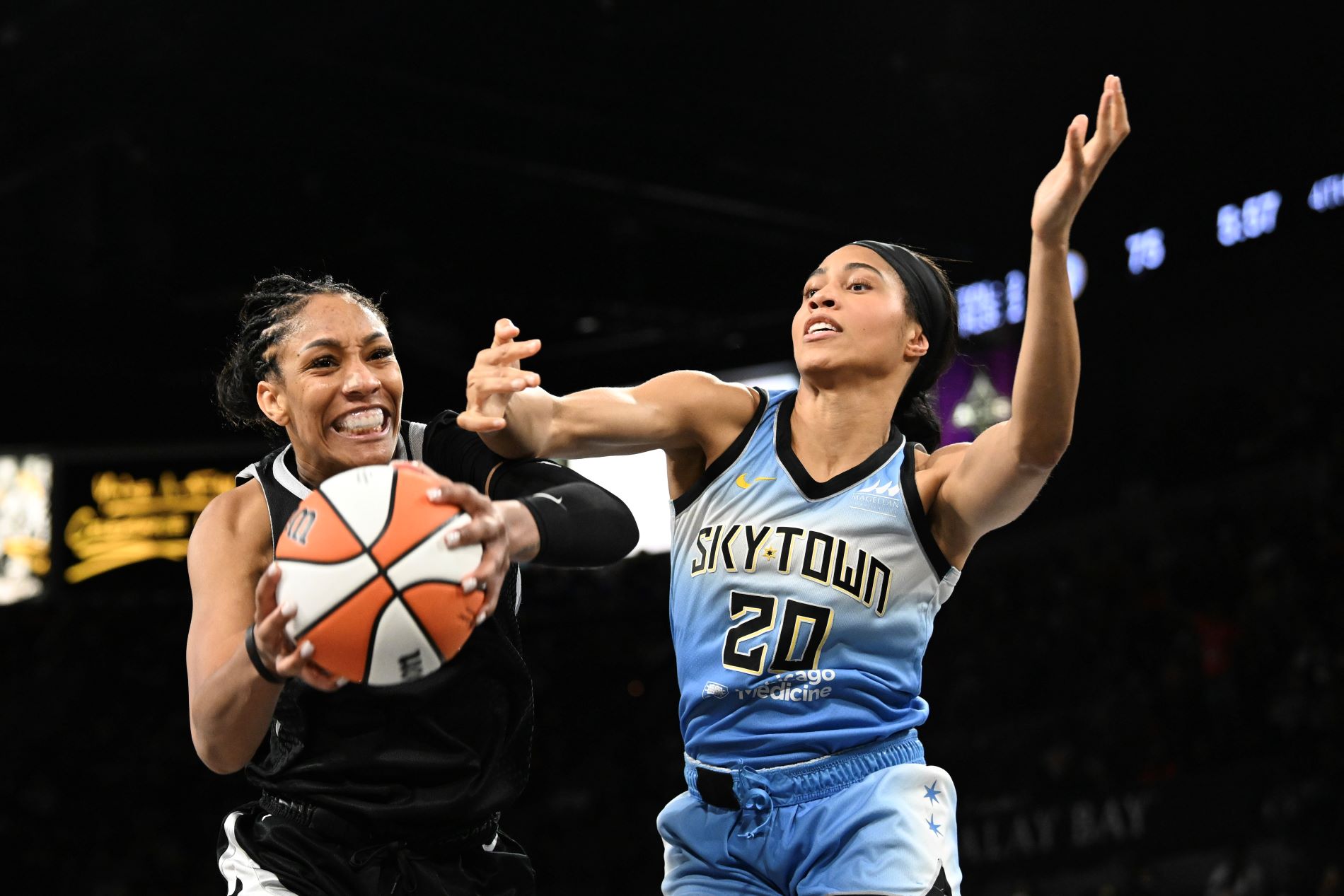 LAS VEGAS, NEVADA - JULY 16: A'ja Wilson #22 of the Las Vegas Aces and Isabelle Harrison #20 of the Chicago Sky battle for a rebound in the second half of their game at Michelob ULTRA Arena on July 16, 2024 in Las Vegas, Nevada. The Sky defeated the Aces 93-85. (Photo by Candice Ward/Getty Images)
