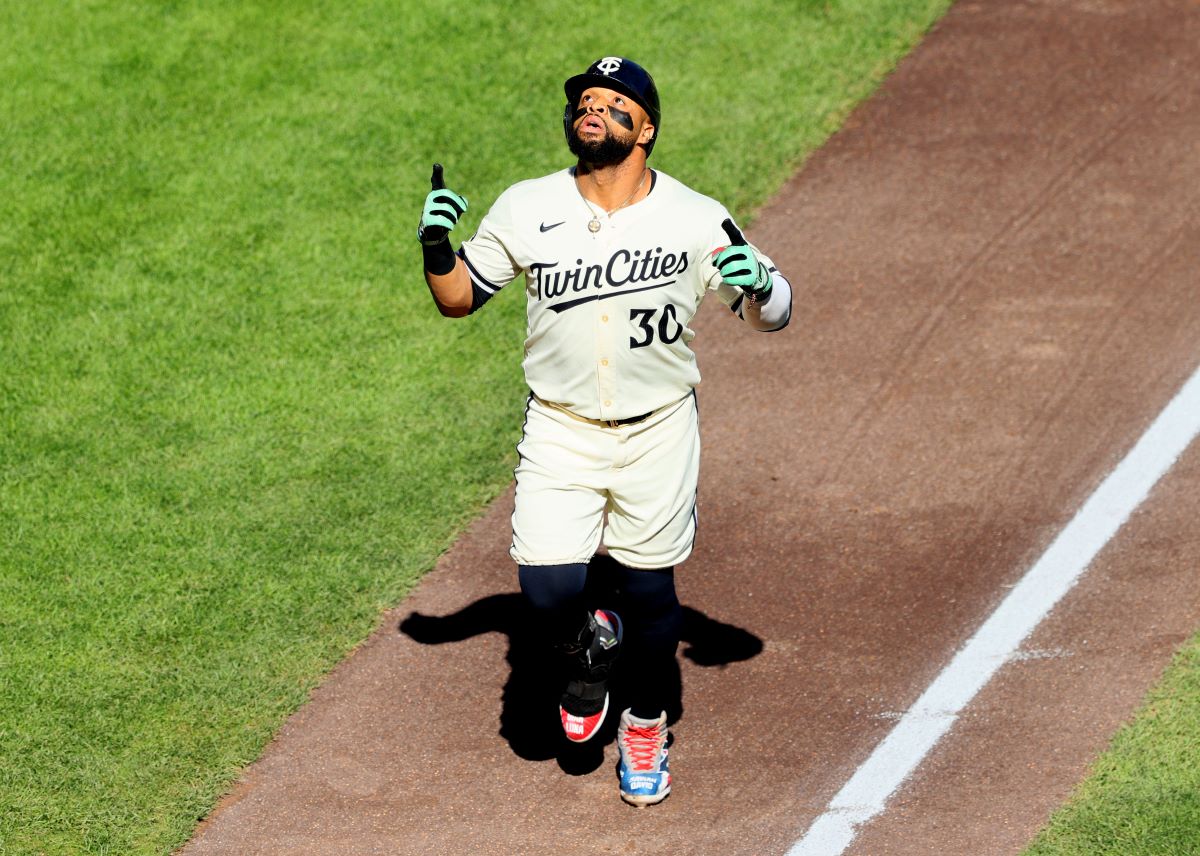 MINNEAPOLIS, MN - SEPTEMBER 29: Carlos Santana #30 of the Minnesota Twins celebrates his solo home run in the second inning against the Baltimore Orioles at Target Field on September 29, 2024 in Minneapolis, Minnesota. (Photo by Adam Bettcher/Getty Images)