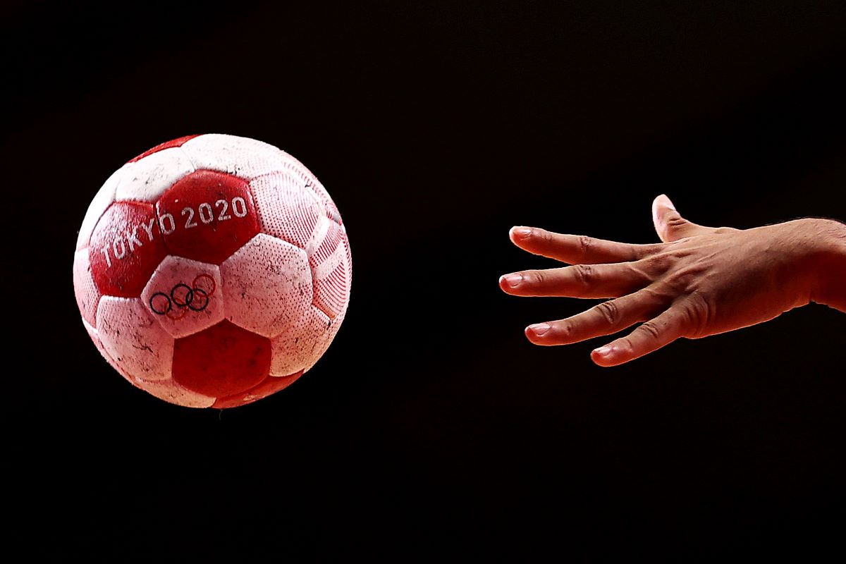 TOKYO, JAPAN - AUGUST 07: The official ball for the Tokyo 2020 Olympic Games handball competition is seen in action during the Men's Bronze Medal handball match between Egypt and Spain on day fifteen of the Tokyo 2020 Olympic Games at Yoyogi National Stadium on August 07, 2021 in Tokyo, Japan. (Photo by Maja Hitij/Getty Images)