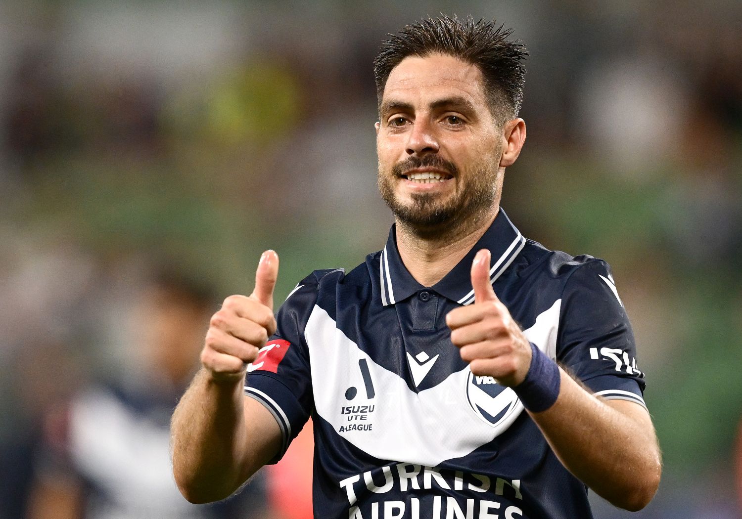 MELBOURNE, AUSTRALIA - MARCH 08: Bruno Fornaroli of Melbourne Victory signals to his team mates during the round 22 A-League Men match between Melbourne Victory and Central Coast Mariners at AAMI Park, on March 08, 2025, in Melbourne, Australia. (Photo by Quinn Rooney/Getty Images)