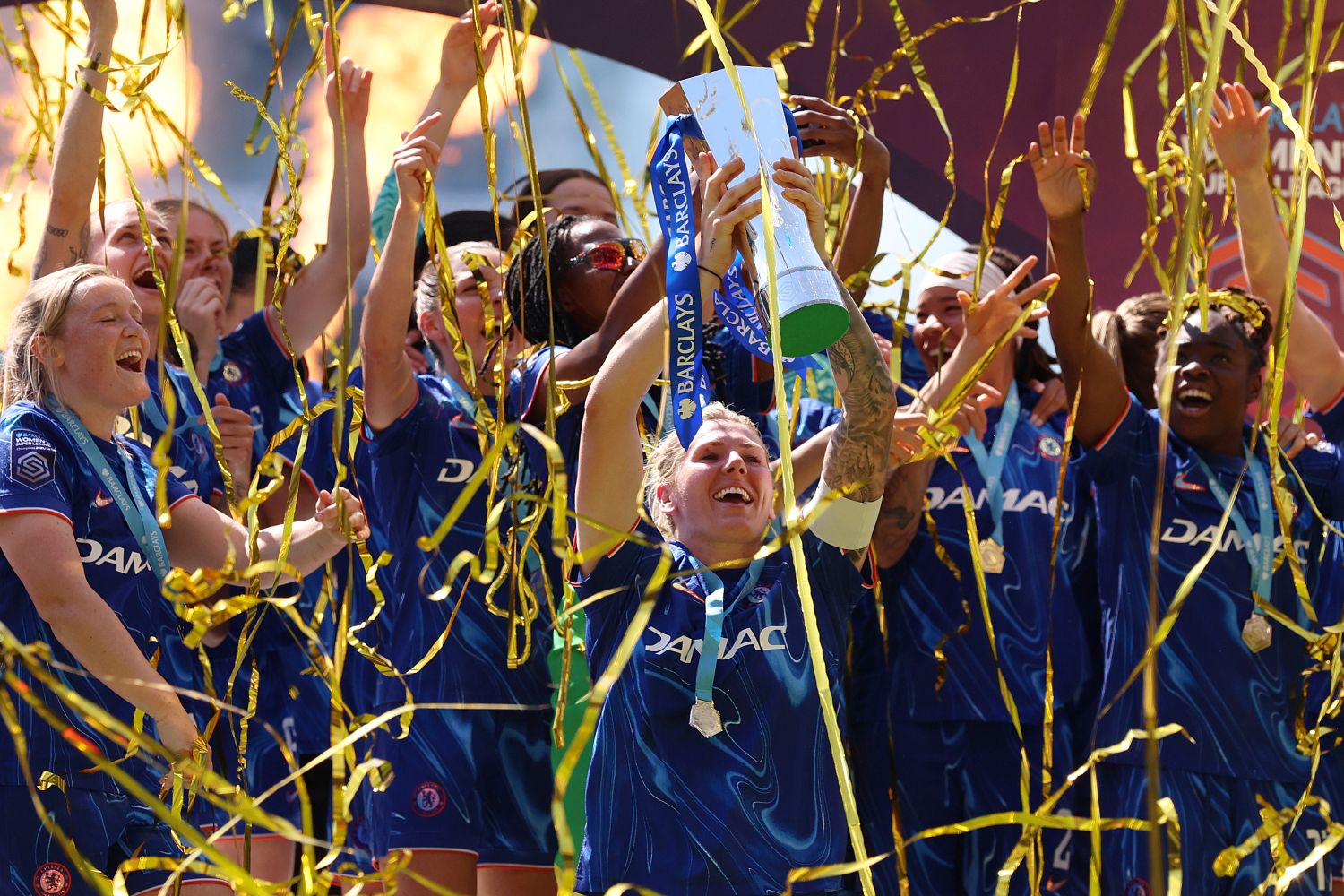 LONDON, ENGLAND - MAY 10: Millie Bright of Chelsea lifts the Barclays Women's Super League title trophy following the team's victory in the Barclays Women's Super League match between Chelsea FC and Liverpool FC at Stamford Bridge on May 10, 2025 in London, England. (Photo by Tom Dulat/Getty Images)