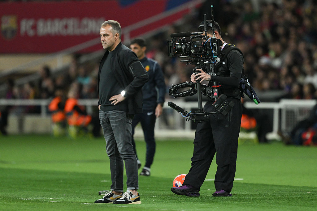 Soccer players in action during a LaLiga⁢ match